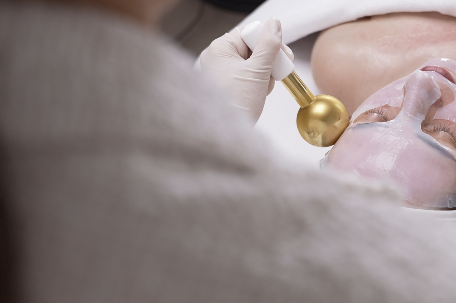 Professional facial treatment at CP Praxis Basel – cosmetician performing a luxury skin care ritual on a client